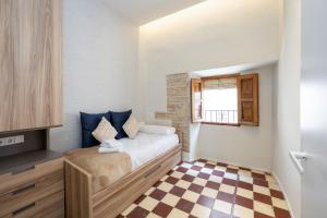 Postel nebo postele na pokoji v ubytování San Pedro Alhambra Views 3BR