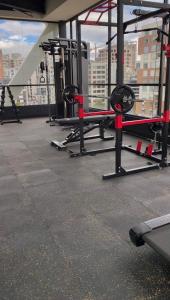 Gimnasio o equipo deportivo en Suite de lujo con balcón en Edificio NEO