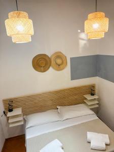 A bed or beds in a room at Vinegia N5 - Clemente & Settimo Apartments