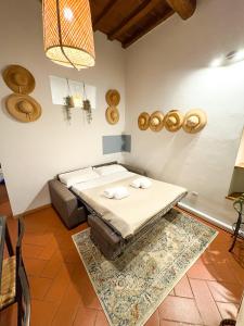 A bed or beds in a room at Vinegia N5 - Clemente & Settimo Apartments