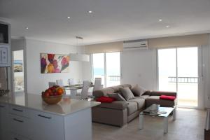 A seating area at Apartamento Quesada