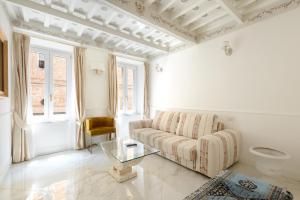 Posezení v ubytování Domus Nannini SPA - L' Arco di Matteotti