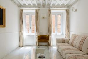 Posezení v ubytování Domus Nannini SPA - L' Arco di Matteotti