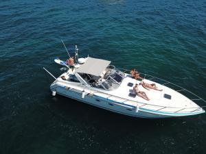 a group of people on a boat in the water at Bluechip in Portimão