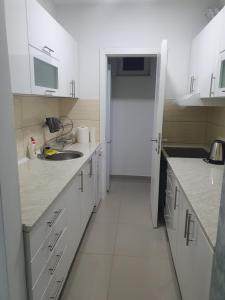 Η κουζίνα ή μικρή κουζίνα στο Lux trosoban