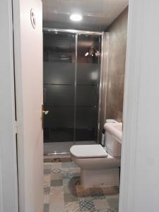 Kúpeľňa v ubytovaní Hostal Dragonflybcn
