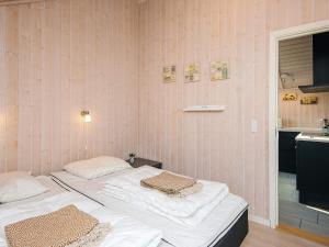Postel nebo postele na pokoji v ubytování Luxury Lakeside Retreat - By Traum Ferienwohnungen