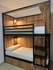 A bed or beds in a room at Hostel Welcome Benidorm