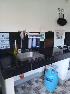 Kuchyň nebo kuchyňský kout v ubytování YOO Darius' Residences