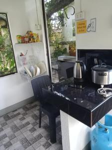 Kuchyň nebo kuchyňský kout v ubytování YOO Darius' Residences