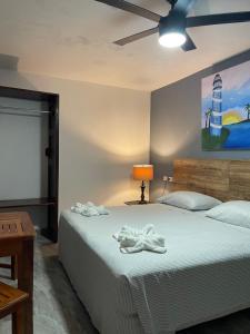 Voodi või voodid majutusasutuse Playa Arena toas