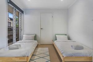 Letto o letti in una camera di Lazy Days in Lennox
