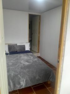 Postel nebo postele na pokoji v ubytování Hotel Mahoma