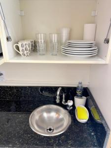 Kuchyň nebo kuchyňský kout v ubytování Flat no paraíso