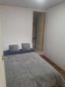 Postel nebo postele na pokoji v ubytování Hotel Mahoma