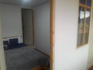 Postel nebo postele na pokoji v ubytování Hotel Mahoma