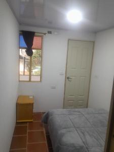 Postel nebo postele na pokoji v ubytování Hotel Mahoma