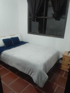 Postel nebo postele na pokoji v ubytování Hotel Mahoma