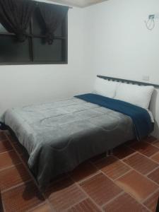 Postel nebo postele na pokoji v ubytování Hotel Mahoma