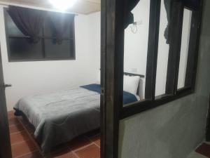 Postel nebo postele na pokoji v ubytování Hotel Mahoma