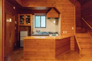 Kuchyň nebo kuchyňský kout v ubytování Izumigo AMBIENT Yatsugatake Cottage