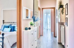 A bed or beds in a room at -Politecnico- Appartamento Classy x5 con Balconi, Vista e Parcheggio Gratuito