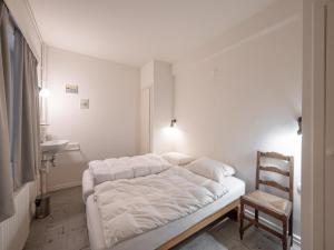 Ένα ή περισσότερα κρεβάτια σε δωμάτιο στο Apartment in Duinbergen by the Sailing School