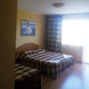 Postel nebo postele na pokoji v ubytování Casa Dalena