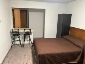 Postel nebo postele na pokoji v ubytování Hotel Centric Chihuahua