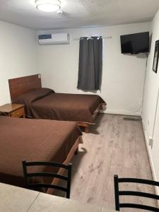 TV a/nebo společenská místnost v ubytování Hotel Centric Chihuahua