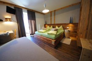 Postel nebo postele na pokoji v ubytování Appartamenti Residence Pars