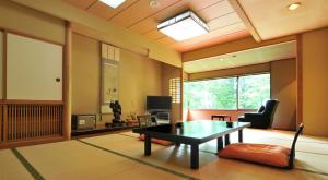 Posezení v ubytování Tsubame Highland Lodge燕ハイランドロッジ