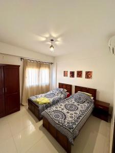 Una cama o camas en una habitación de Dahab Dolphin