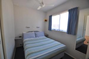 Letto o letti in una camera di BIG4 Riverside Swan Hill