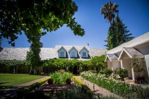 a house with a garden in front of it at Barney Barnato in Kimberley