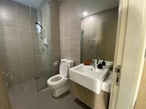 a white bathroom with a toilet and a sink at The Nordic - Icon City Petaling Jaya in Petaling Jaya +33 photos