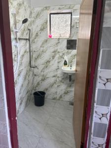 Koupelna v ubytování Chengai homestay