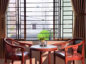 Posezení v ubytování BÊ TÔNG RESIDENCES HOMESTAY