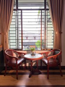 Posezení v ubytování BÊ TÔNG RESIDENCES HOMESTAY