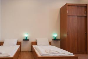 Broadway City Guesthouse客房内的一张或多张床位