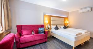 Postel nebo postele na pokoji v ubytování PLAZA INN Braunschweig City Süd
