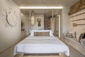 Ein Bett oder Betten in einem Zimmer der Unterkunft Phangan Bayshore Resort Koh Phangan