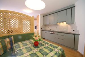 Kuchyň nebo kuchyňský kout v ubytování Appartamenti Residence Pars