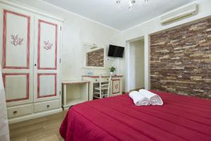 Imagem da galeria de Morpheo Rooms em Alghero