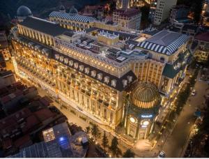 an aerial view of a large building at night at Home 33 in Sa Pa