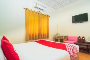 TV a/nebo společenská místnost v ubytování OYO 534 Phasuk Hotel