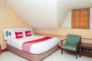 Postel nebo postele na pokoji v ubytování OYO 534 Phasuk Hotel