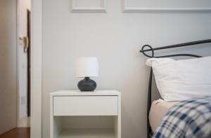 Letto o letti in una camera di Smile Suite in Milan
