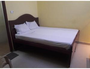 Voodi või voodid majutusasutuse Karthick Lodge, Rameswaram toas