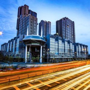 a city skyline with tall buildings and a freeway at The Caspian - Icon City Petaling Jaya in Petaling Jaya